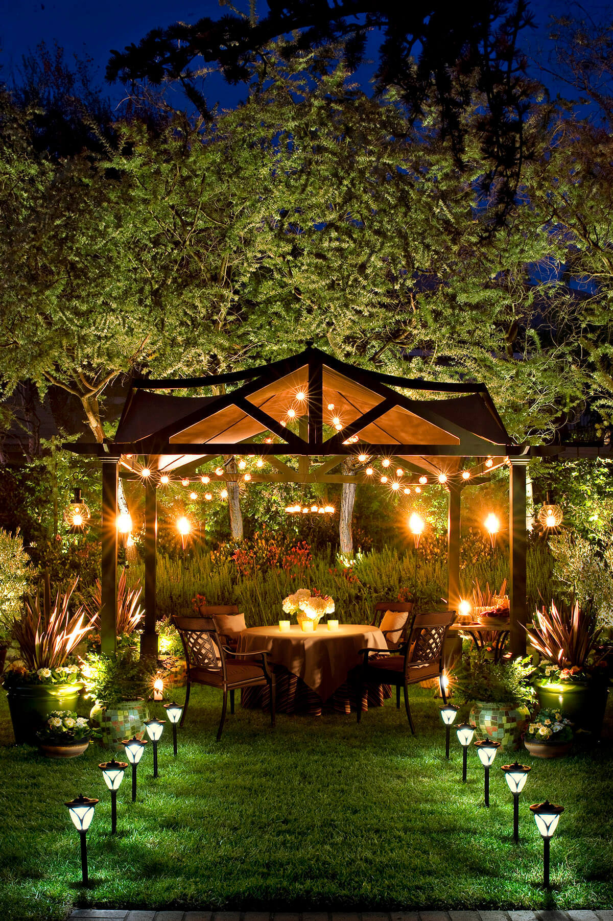 Elegant Well-Lit Backyard Dinner Party Pergola