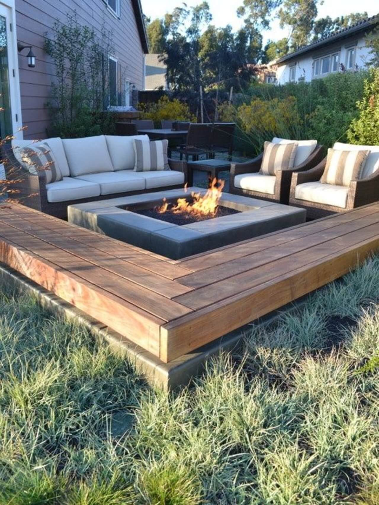 Centered Fire Pit With Sofa and Matching Armchairs