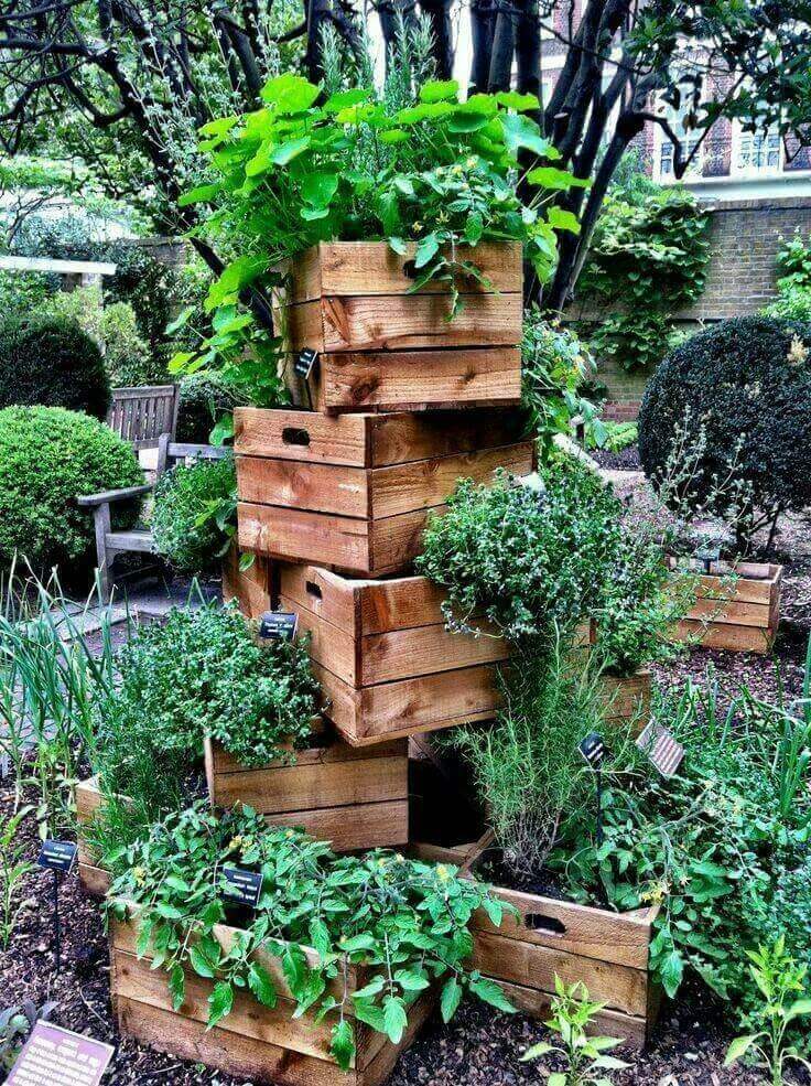 Stacked Crates with Overflowing Greenery