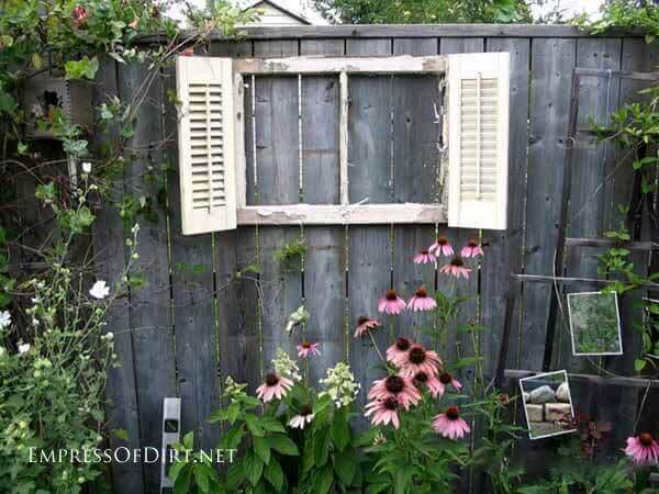 Upcycled Shuttered Window Frame on the Fence