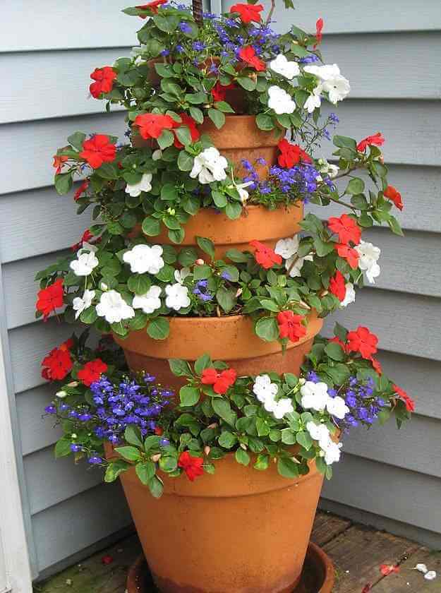 Tower Of Potted Red, White, And Blue