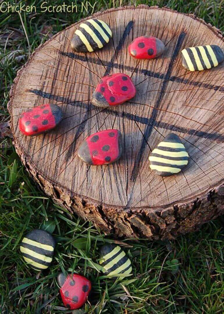 A Tic-Tac-Toe Board with Ladybugs and Bumble Bees
