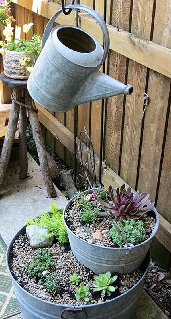 DIY Flower Towers Ideas: Watering the Succulent Bucket Tower