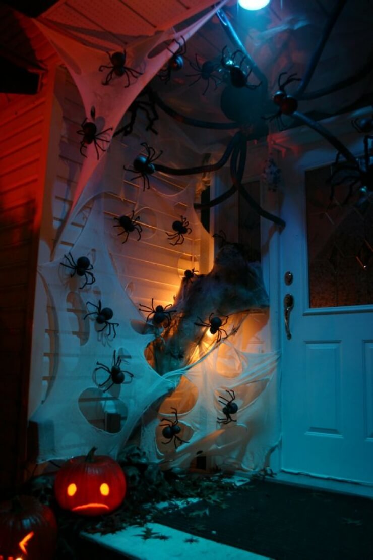 The Creepy-Crawly Home | Scary DIY Halloween Porch Decoration Ideas | vintage halloween porch
