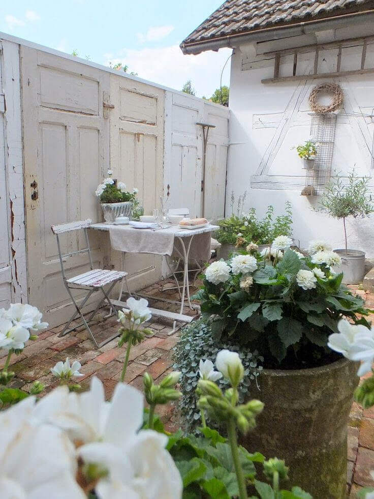Reclaimed Doors make the Garden Wall | Creative Repurposed Old Door Ideas & Projects For Your Backyard