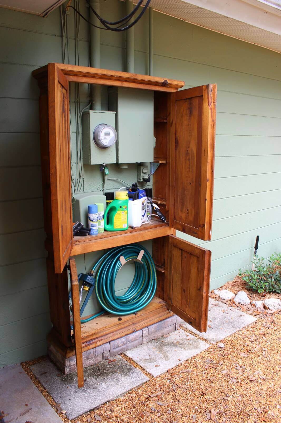 Lovely Cabinet Hides Utility Box and Garden Tools | Outdoor Eyesore Hiding Ideas