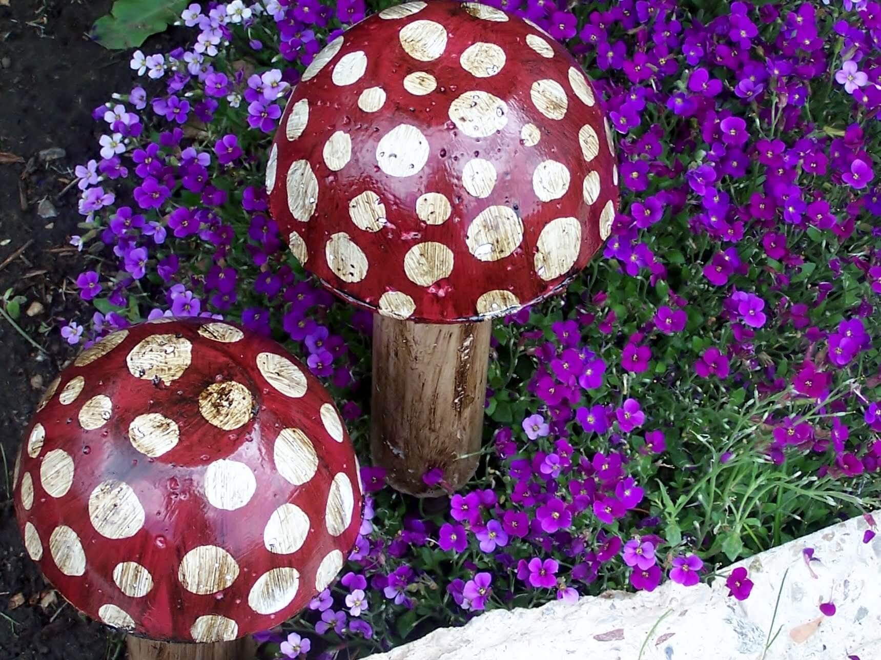 Polka Dot Mushrooms Amongst the Flowers | DIY Painted Garden Decoration Ideas