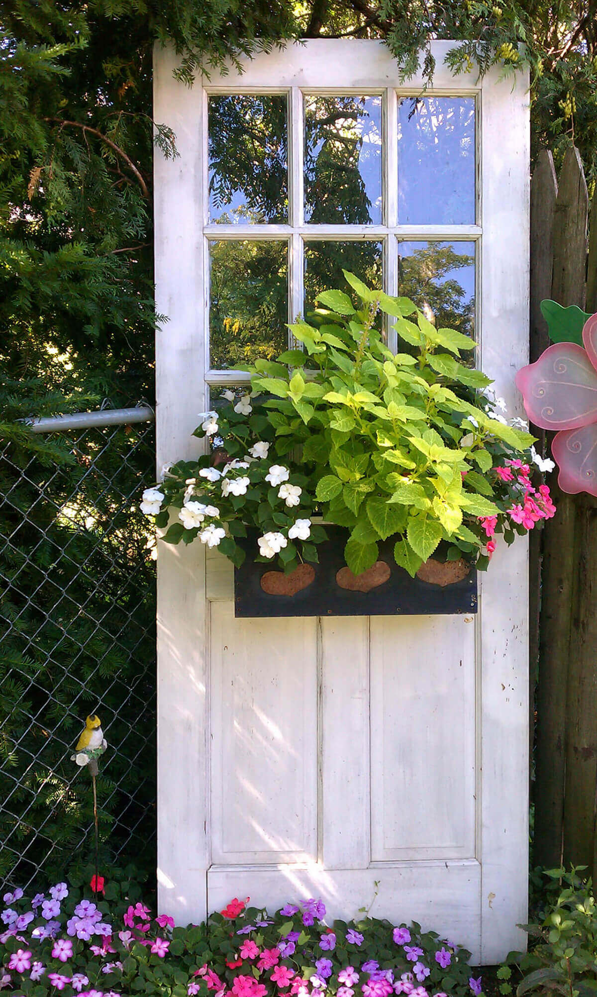 Standing Door with Blooming Flower Box | Creative Repurposed Old Door Ideas & Projects For Your Backyard