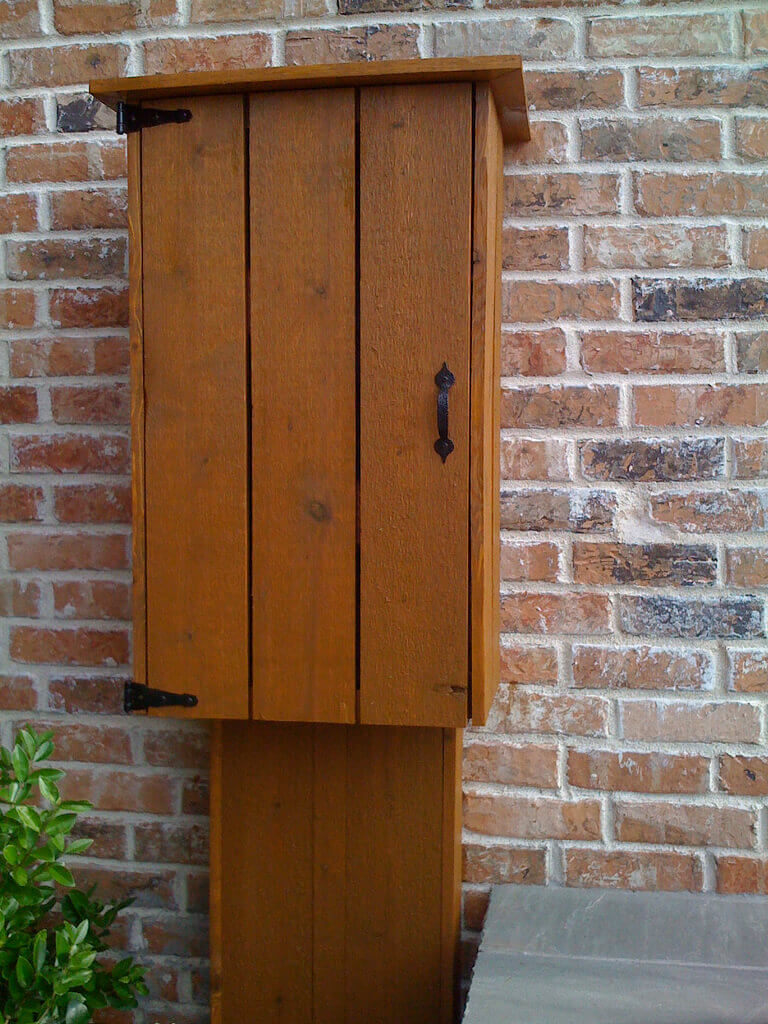 This Pretty Cabinet Hides Utility Box and Wires | Outdoor Eyesore Hiding Ideas