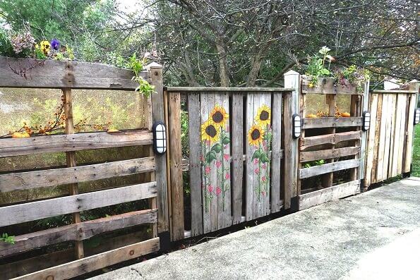 DIY Fence Ideas: Hand Painted Recycled Wooden Pallet Fence