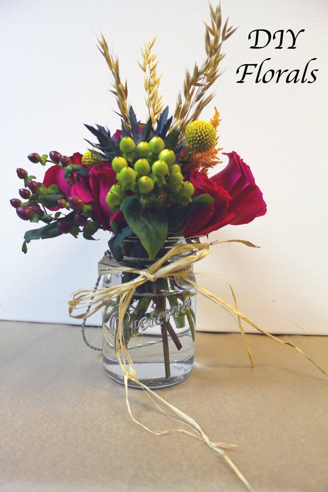 Mason Jar Arrangement with Raffia Bow | Beautiful DIY Mason Jar Flower Arrangements Ideas