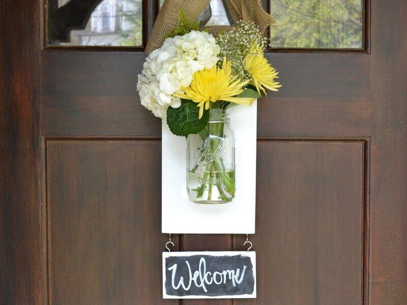 Mason Jar Flowers on a Welcome Sign | Beautiful DIY Mason Jar Flower Arrangements Ideas
