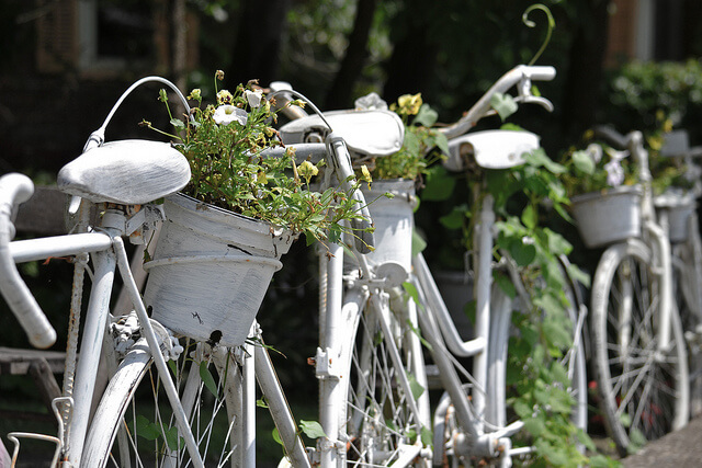 Bicycle fence | Bicycle Garden Planter Ideas For Backyards | FarmFoodFamily