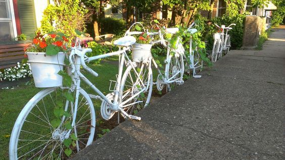 Cool bicycle fence | Bicycle Garden Planter Ideas For Backyards | FarmFoodFamily
