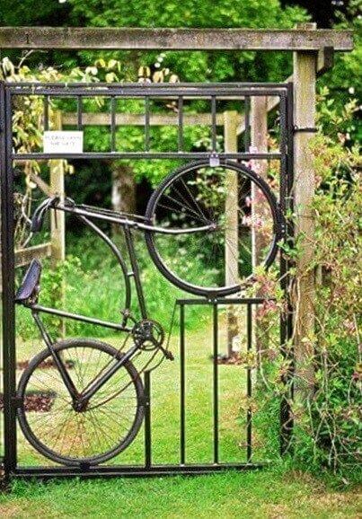 Bicycle gate | Bicycle Garden Planter Ideas For Backyards | FarmFoodFamily