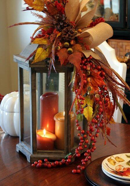 Fall themed centerpiece with candles and leaves | DIY Fall Candle Decoration Ideas - Farmfoodfamily.com