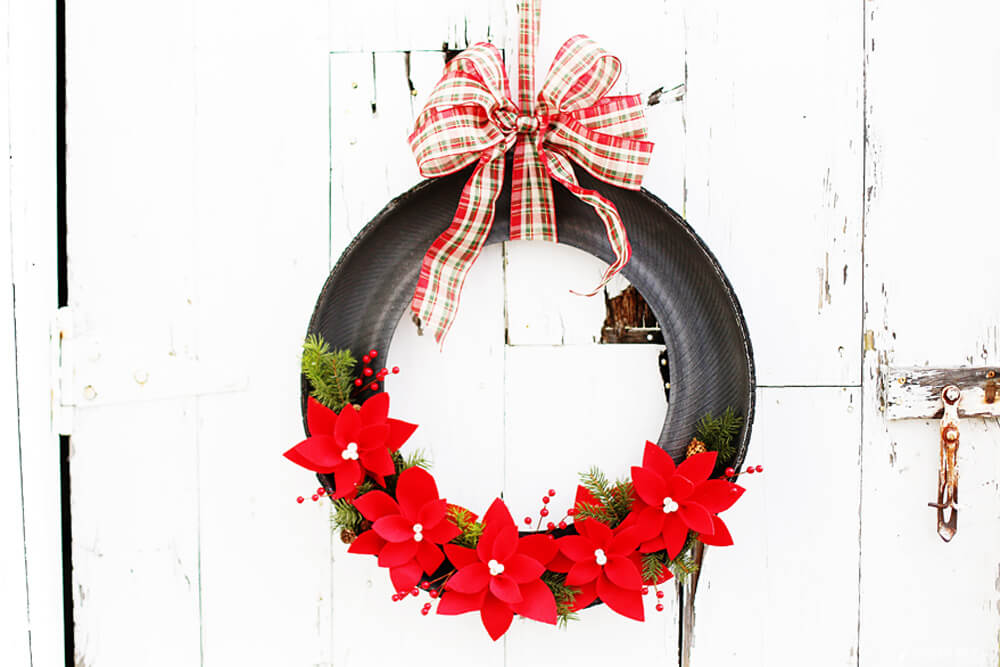 Holiday Poinsettia Tire Wreath | Best Recycled Tire Christmas Decoration Ideas | FarmFoodFamily.com