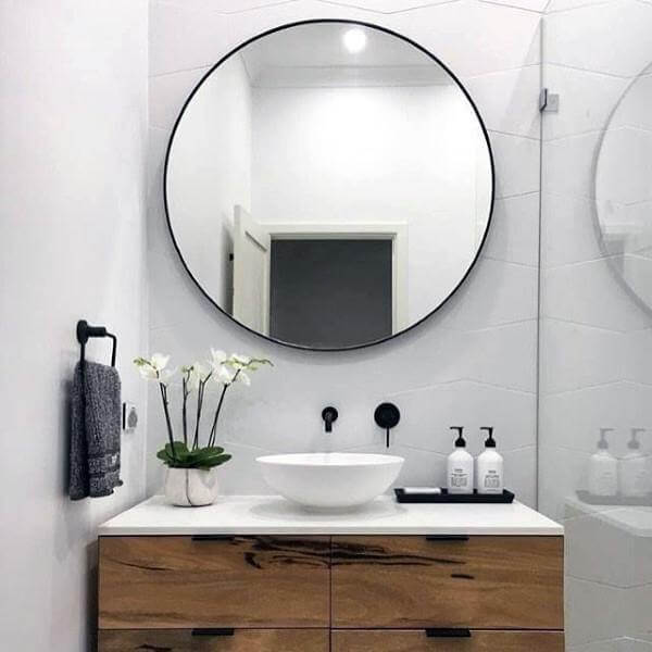 Use Mirrors to Create the Illusion of Space | Easy Ways to Make a Small Bathroom Look Larger | FarmFoodFamily.com