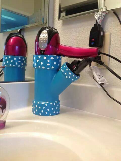 PVC pipe painted and used as hair dryer holder | Best Small Bathroom Storage Designs & Ideas