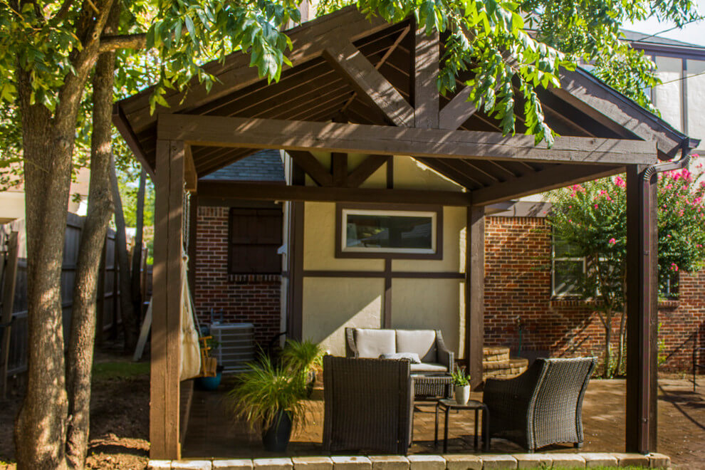 Wooden Backyard Pavilion with a Brick Paver Patio