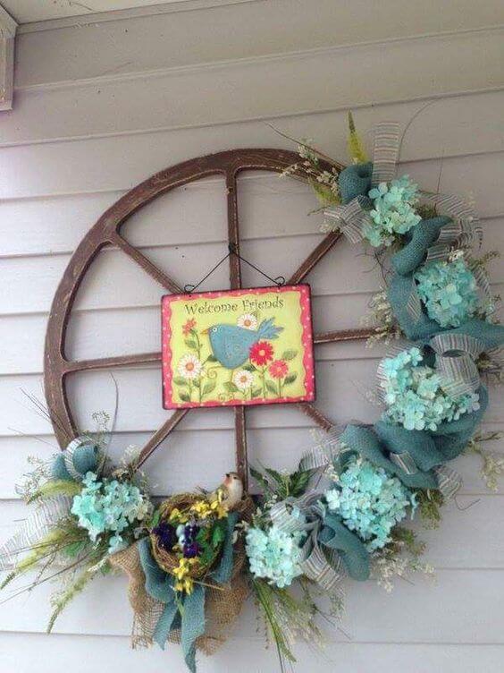 Old Wheel Decorated With Flowers For Easter | Best Easter Porch Decorating Ideas