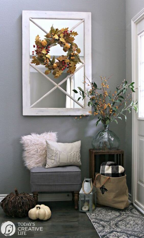 A mirror with bench | Best Small Entryway Decor & Design Ideas | Small Mudroom Ideas | FarmFoodFamily.com