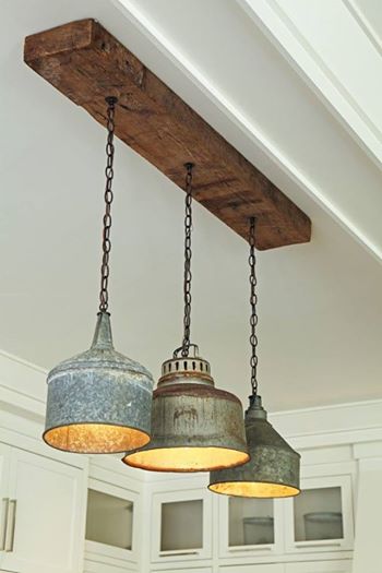 Rustic light fixture is made from old tin funnels | Trending & Vintage Porch Lighting Ideas & Designs | FarmFoodFamily.com