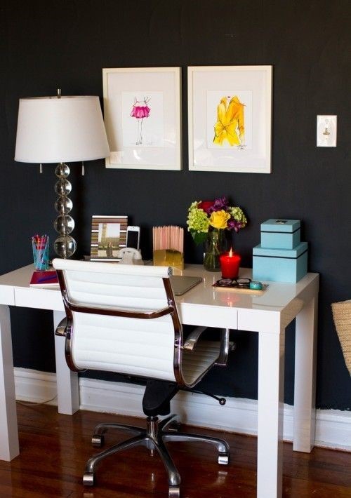 Painting a wall of black will make your furniture contrast
