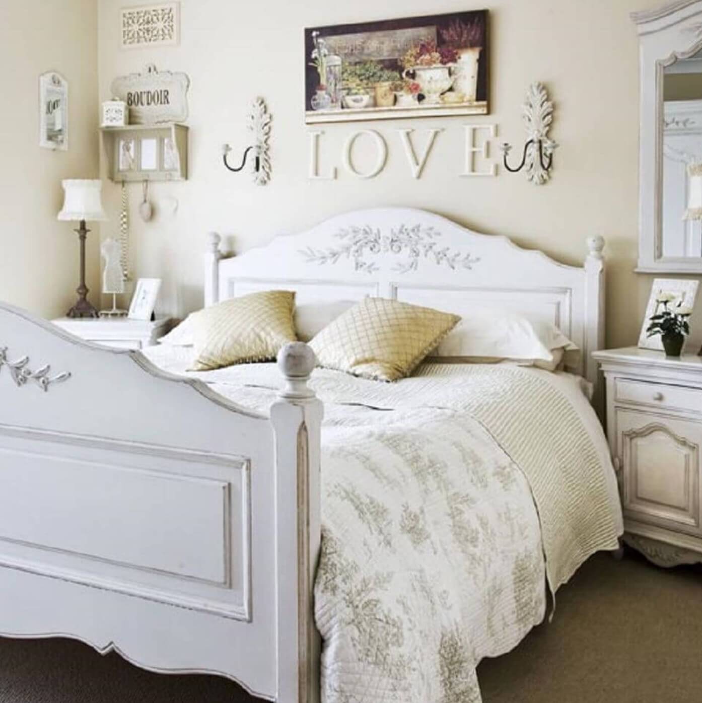 White bed and wooden love letters