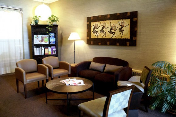 9 Chiropractic patients waiting room conceived as a living room