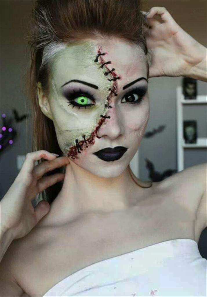 Girl with makeup for halloween as zombie without half of the face