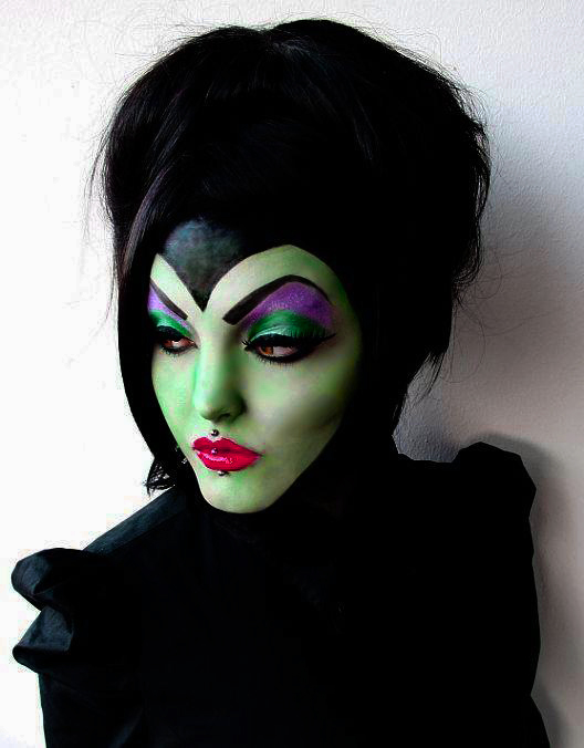 Girl with makeup for halloween as maleficent