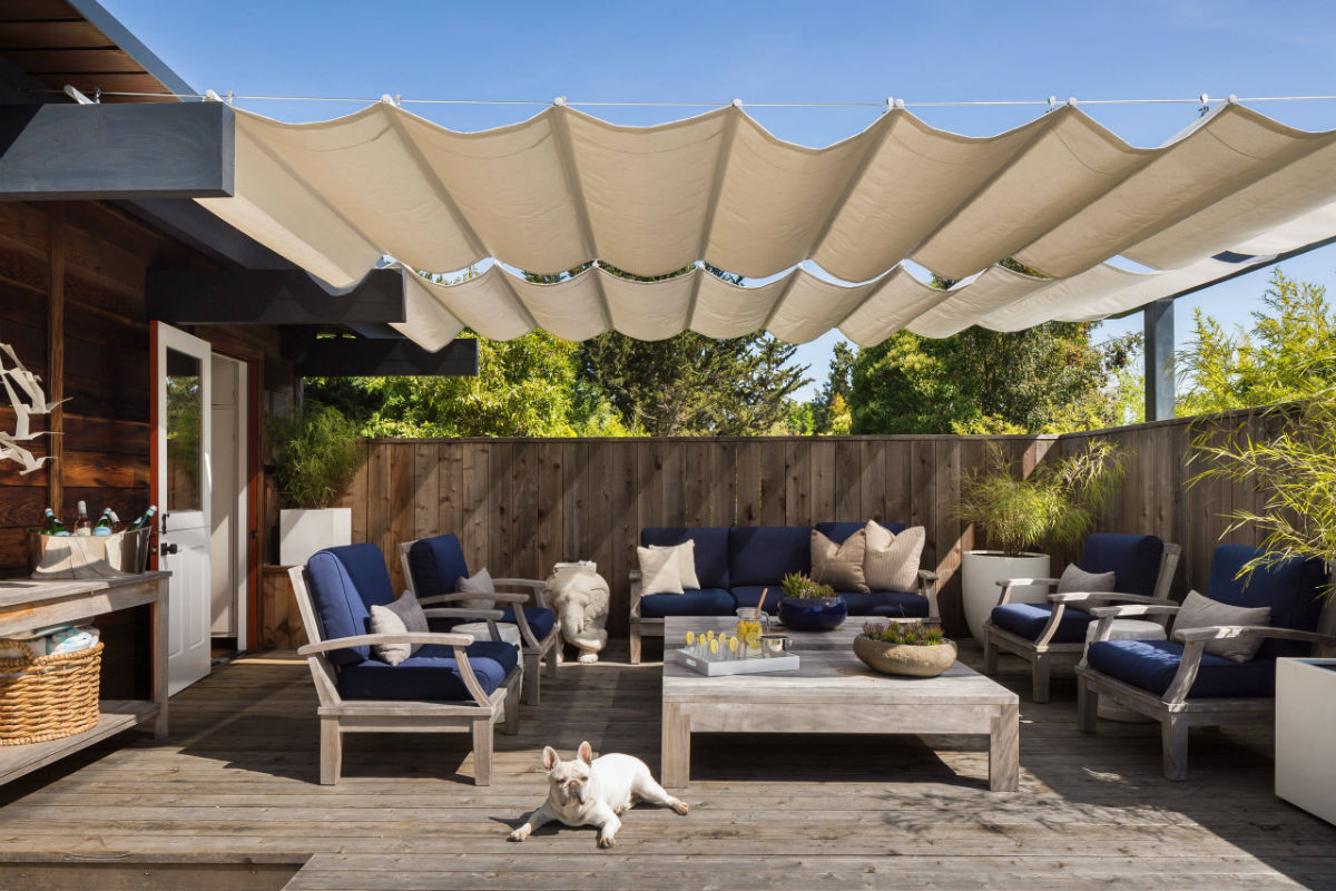 Stain deck with shade sail