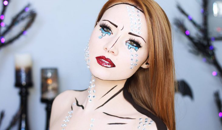 Girl with makeup for halloween as a pop art cartoon
