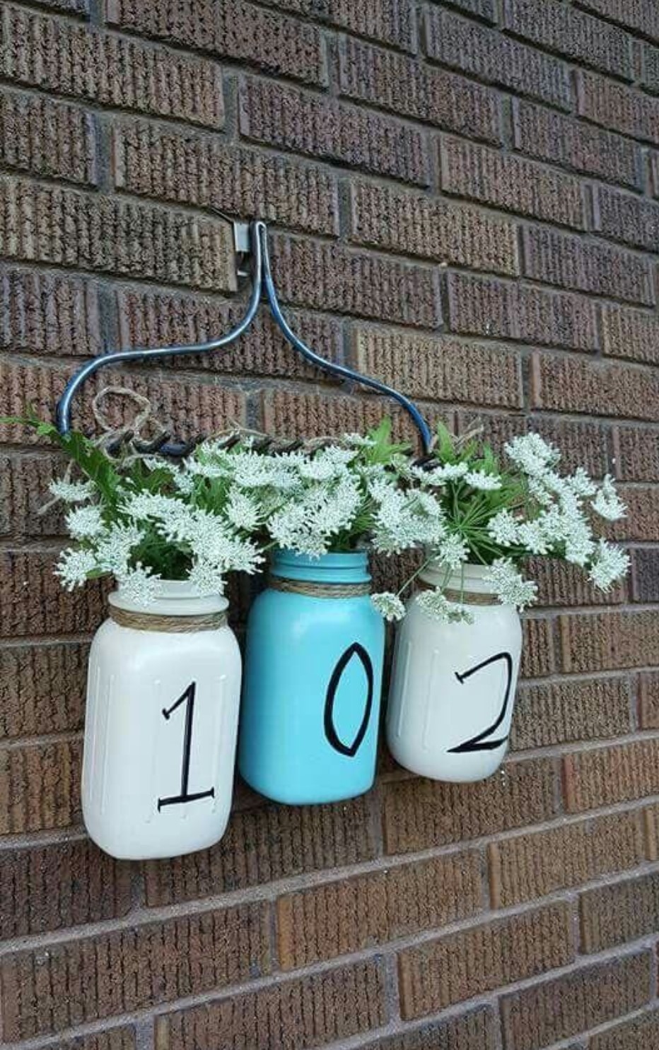 Hanging Milk Bottles with Flowers