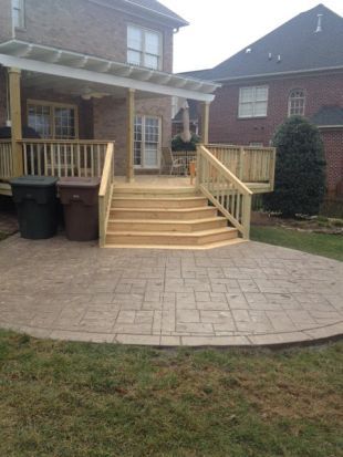 Stamped concrete patio with deck
