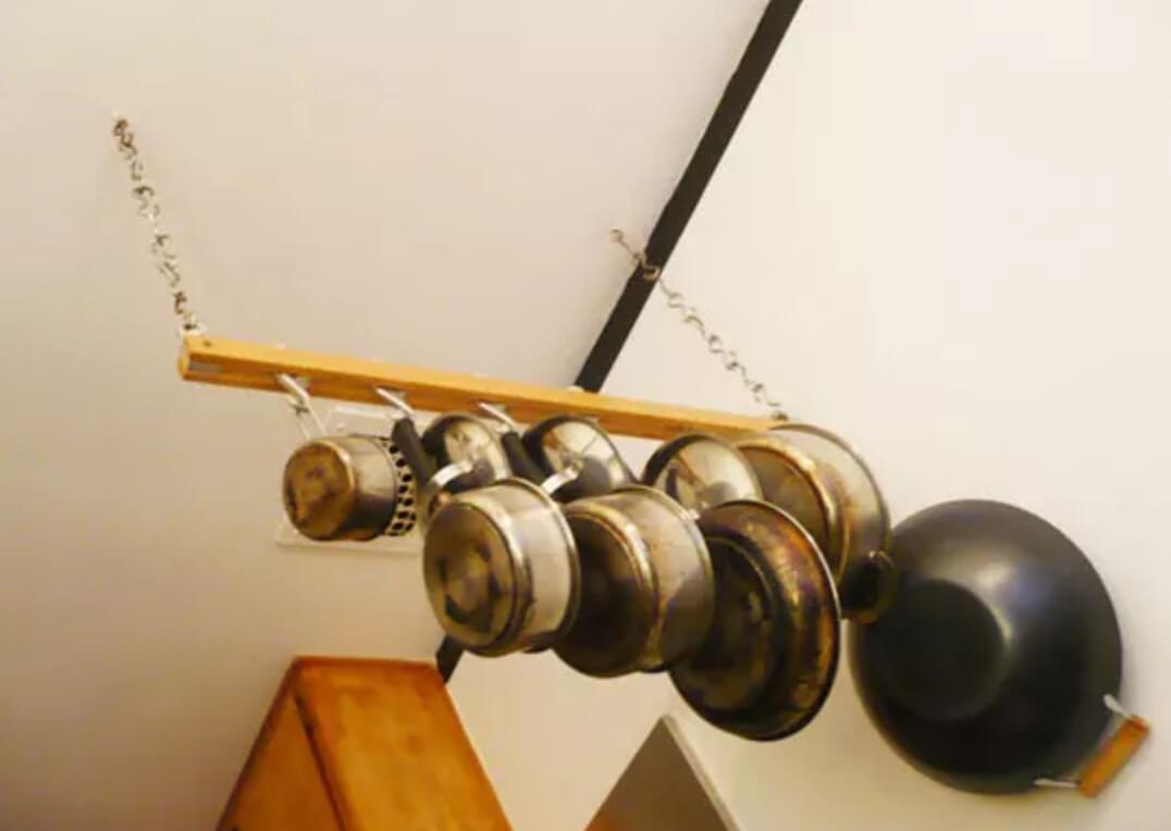 Hanging pots from ceiling rack