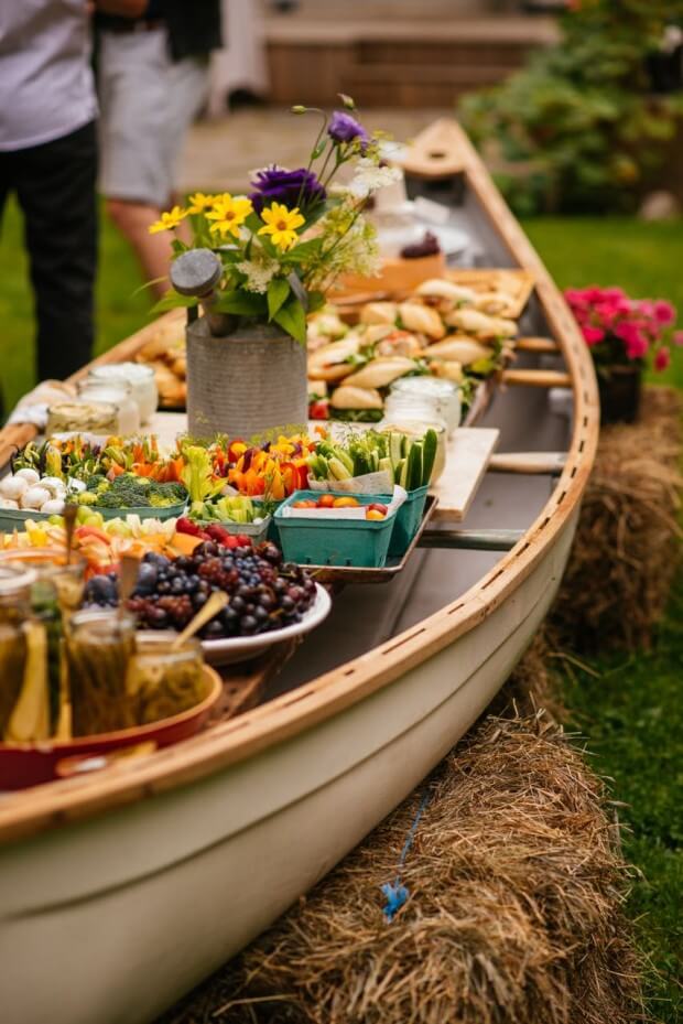 Setup an outdoor buffet in a canoe