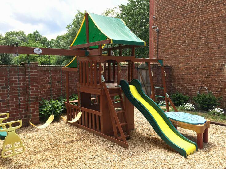 A Backyard with Rowhouse Play Space