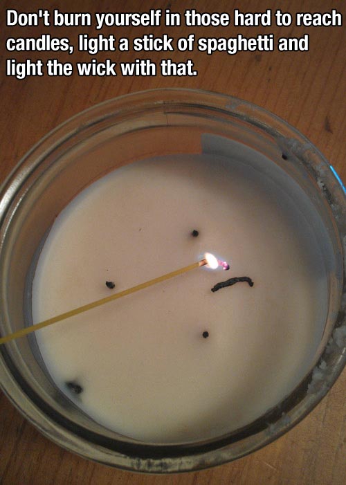 Use a stick of spaghetti to light a candle wick