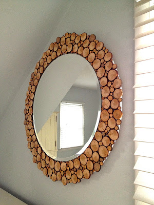 Circular mirror with wood slide