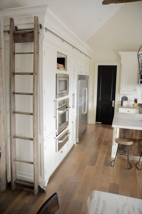 Farmhouse kitchen with library ladder