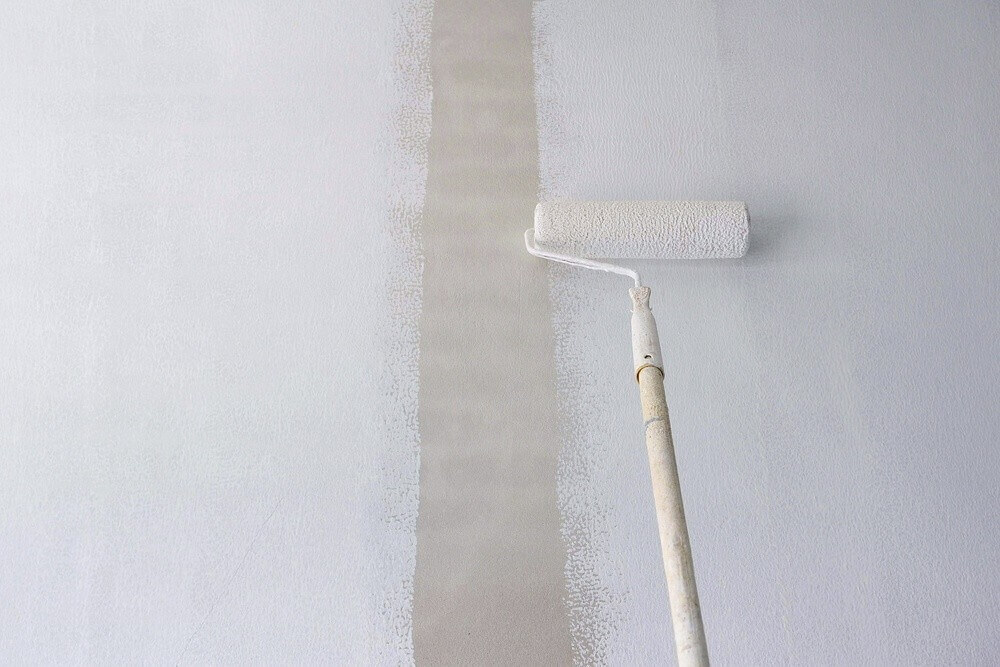 apply primer on white wall