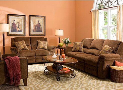 27 peach wall with brown sofa