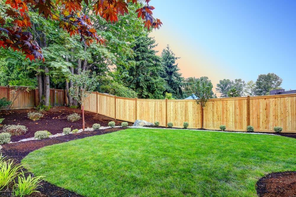 fence on sloped backyard