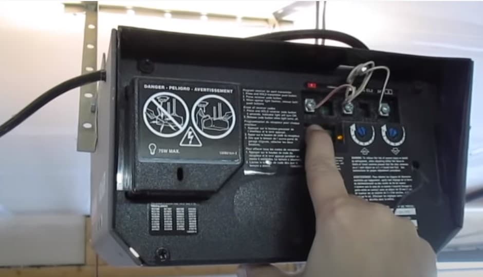 3 hold the learn button on craftsman garage door opener