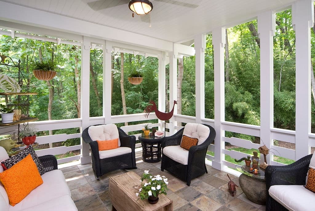 enclosed back deck porch with furniture
