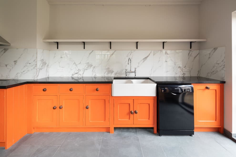 8 orange kitchen cabinet goes with gray floors