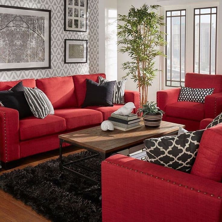 12 black pillows with red couch