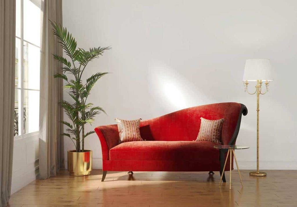 14 brass pillows with red couch 1